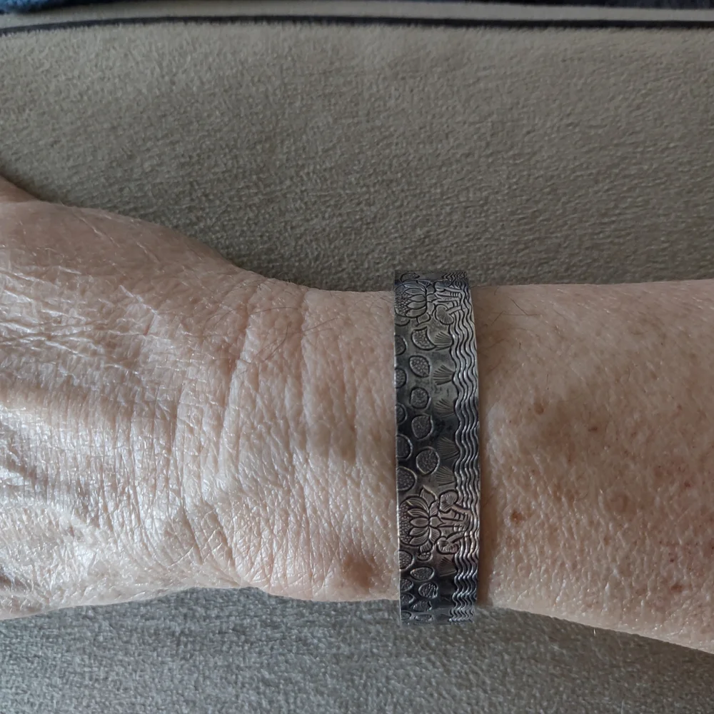Vintage Silvertone Bracelet With Engraved Floral Accents